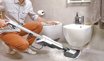 Polti Vaporetto Style cleaning under sanitary ware